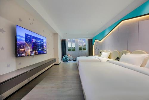 Imagen de la habitación del Hotel Wonderful Guangzhou Changlong Guangdi Garden Branch - Free Shuttle Bus to Canton Fair Complex. Foto 17