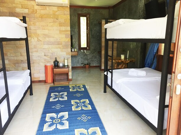 Imagen de la habitación del Hotel Wonderland Healing Center. Foto 22
