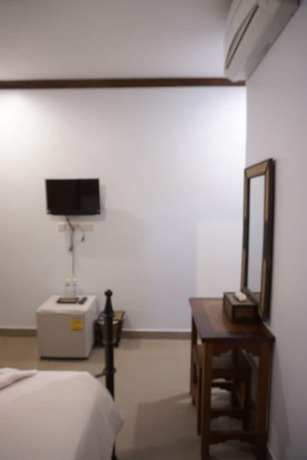 Imagen de la habitación del Hotel Wongsaisiri Srichiangkhan. Foto 8