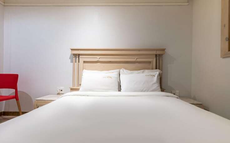 Imagen de la habitación del Hotel Wonju 2in. Foto 11