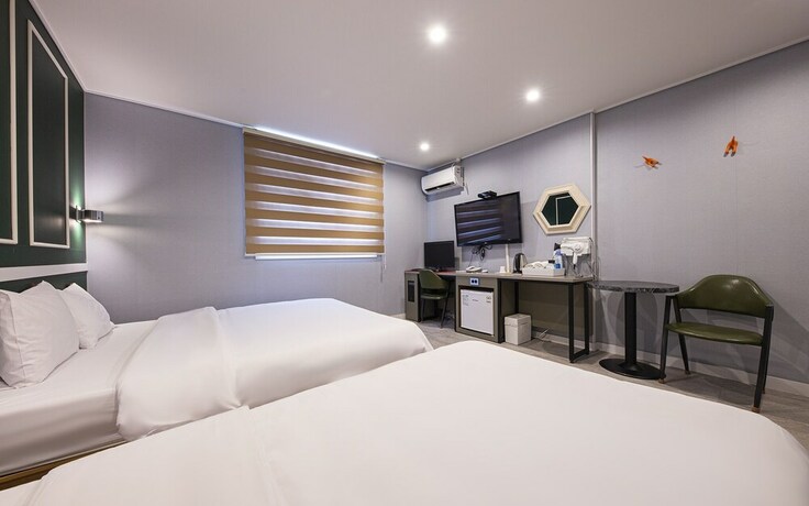 Imagen de la habitación del Hotel Wonju V. Foto 39