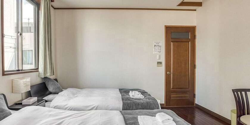 Imagen de la habitación del Hotel Woo House. Foto 30