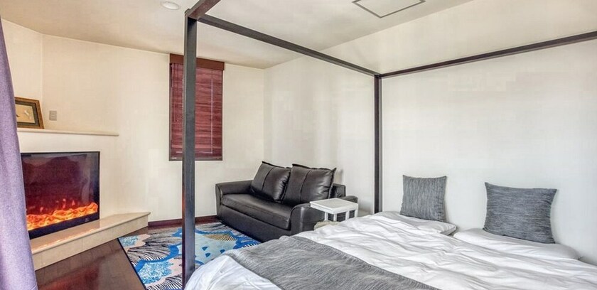 Imagen de la habitación del Hotel Woo House. Foto 31