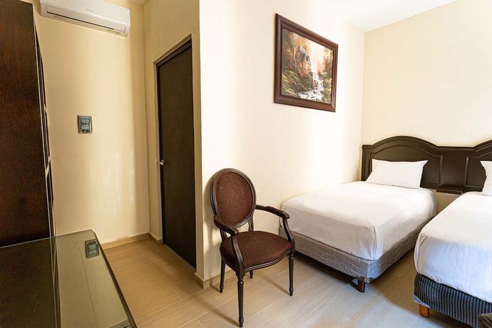 Imagen de la habitación del Hotel Woo Rooms. Foto 8