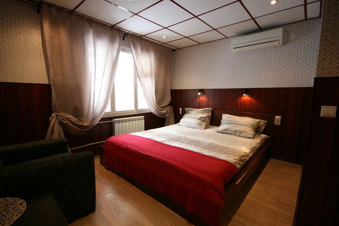 Imagen de la habitación del Hotel Wood Design. Foto 11