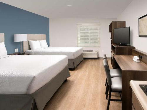 Imagen de la habitación del Hotel WoodSpring Suites Concord-Charlotte Speedway. Foto 17