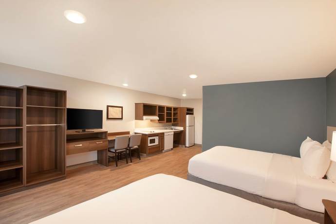 Imagen de la habitación del Hotel WoodSpring Suites Dallas Plano Central Legacy Drive. Foto 9