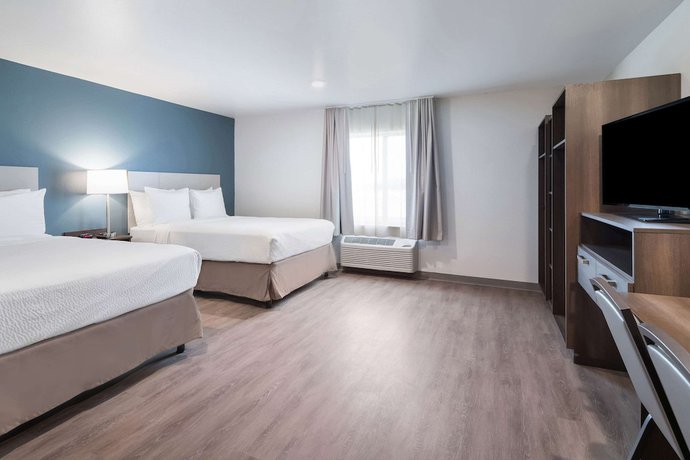Imagen de la habitación del Hotel WoodSpring Suites Dallas Plano Central Legacy Drive. Foto 12