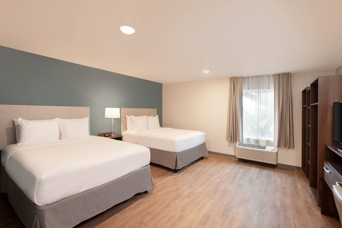 Imagen de la habitación del Hotel WoodSpring Suites Dallas Plano Central Legacy Drive. Foto 13