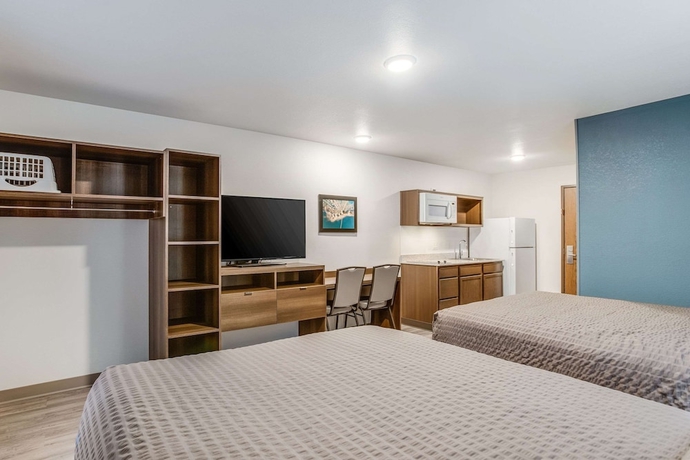 Imagen de la habitación del Hotel WoodSpring Suites Detroit Farmington Hills. Foto 9