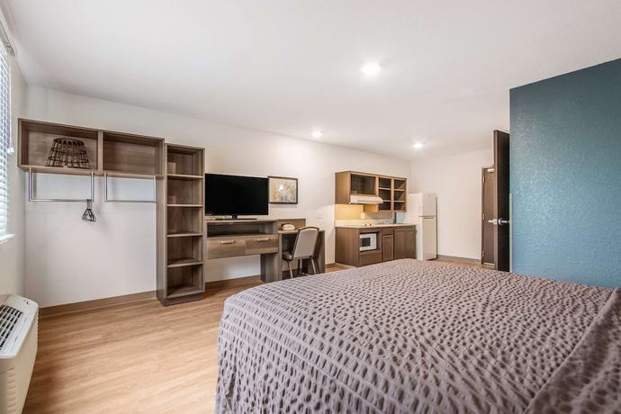 Imagen de la habitación del Hotel WoodSpring Suites Doral Miami Airport. Foto 12