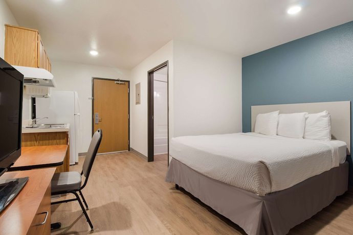 Imagen de la habitación del Hotel WoodSpring Suites Houston I-45 Airtex. Foto 13