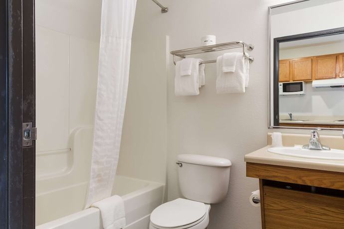 Imagen de la habitación del Hotel WoodSpring Suites Houston I-45 Airtex. Foto 14