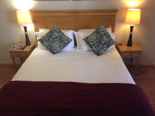 Imagen de la habitación del Hotel Woodbridge Lodge. Foto 1