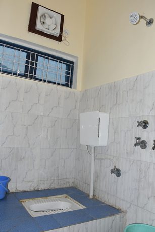 Imagen de la habitación del Hotel Wooden Umbrella. Foto 8