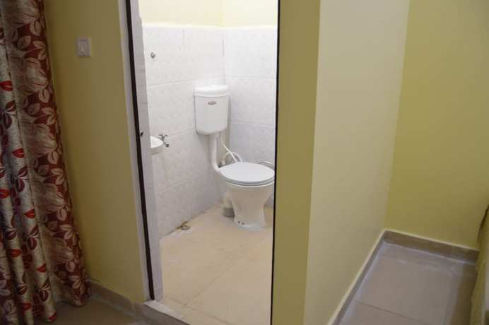 Imagen de la habitación del Hotel Wooden Umbrella. Foto 16