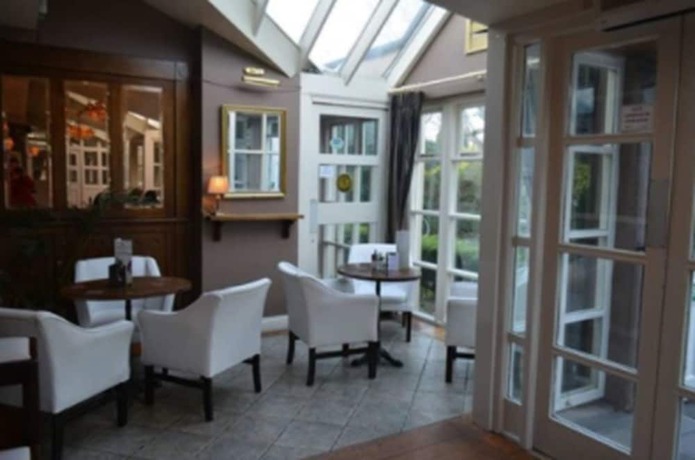Imagen del bar/restaurante del Hotel Woodfield House. Foto 2