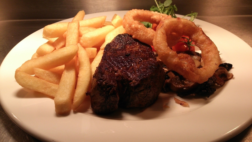 Imagen del bar/restaurante del Hotel Woodland Bay. Foto 5