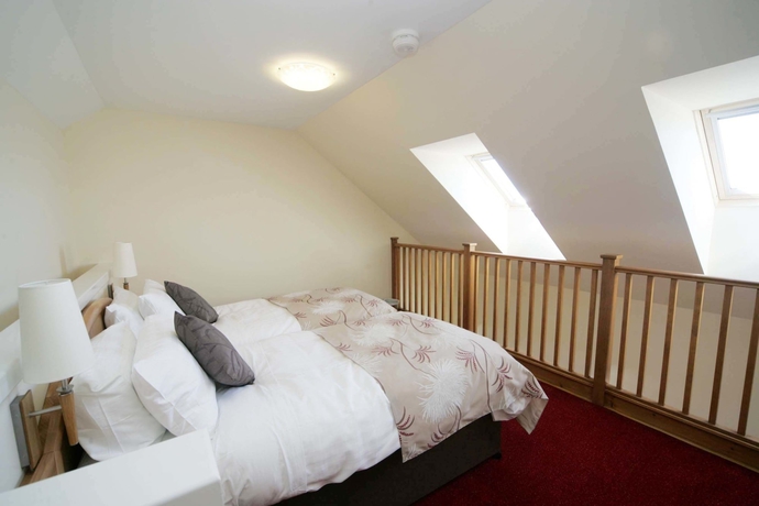 Imagen de la habitación del Hotel Woodland Bay. Foto 13