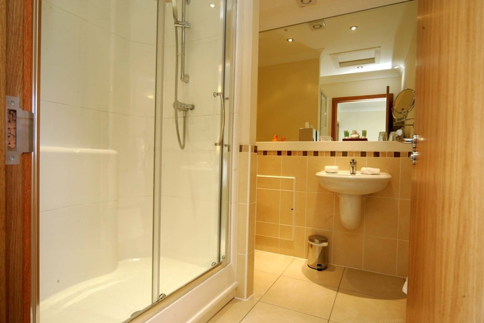 Imagen de la habitación del Hotel Woodland Bay. Foto 16