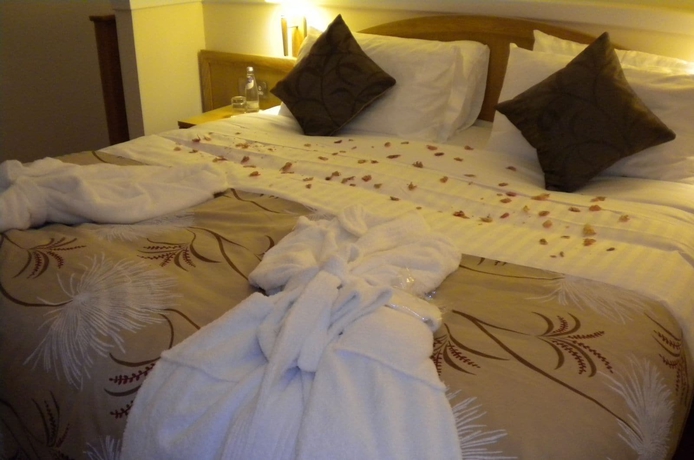 Imagen de la habitación del Hotel Woodland Bay. Foto 19