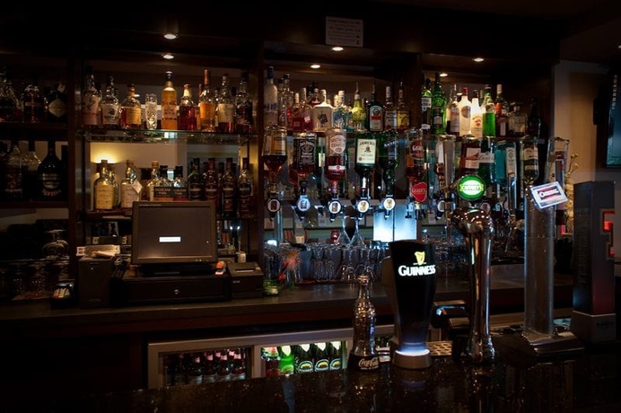 Imagen del bar/restaurante del Hotel Woodland Bay. Foto 6