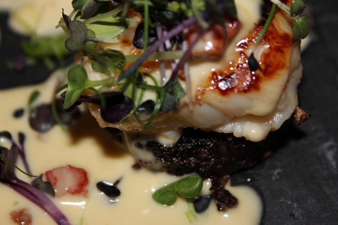 Imagen del bar/restaurante del Hotel Woodland Bay. Foto 9