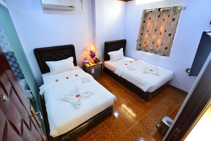 Imagen de la habitación del Hotel Woodland. Foto 16