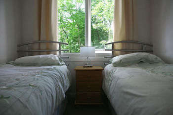 Imagen de la habitación del Hotel Woodland Lodge. Foto 11