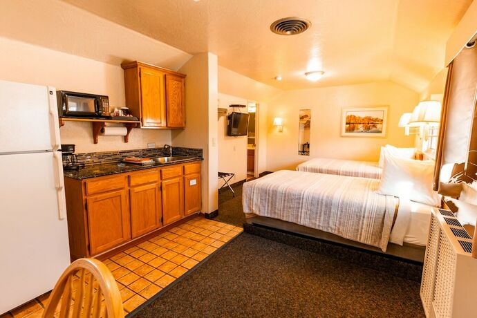 Imagen de la habitación del Hotel Woodland Motel. Foto 11