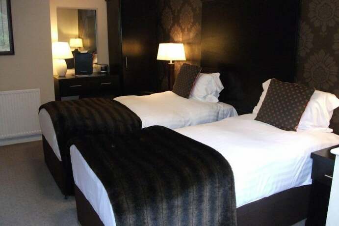 Imagen de la habitación del Hotel Woodlands Guest House Windermere. Foto 15