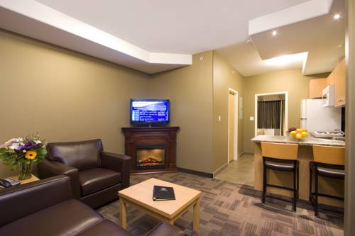 Imagen de la habitación del Hotel Woodlands Inn & Suites. Foto 13