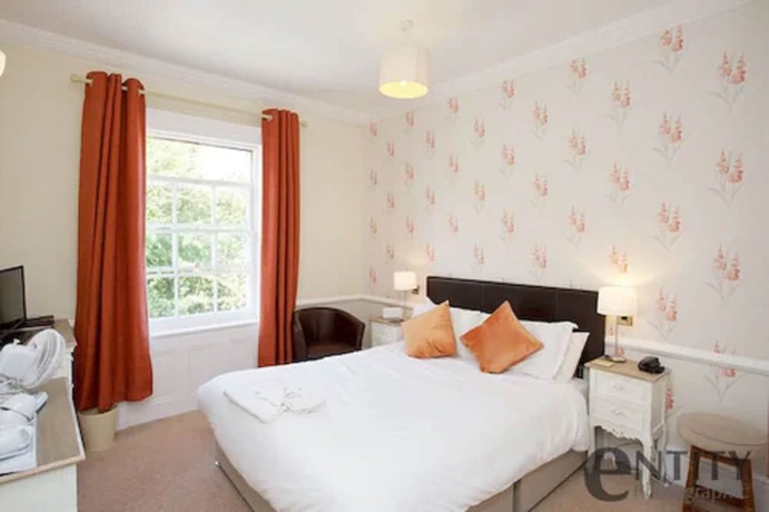 Imagen de la habitación del Hotel Woodlands Lodge. Foto 6