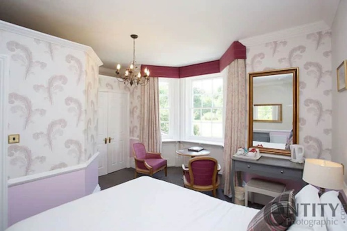 Imagen de la habitación del Hotel Woodlands Lodge. Foto 13