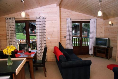 Imagen de la habitación del Hotel Woodlands & Pine Lodges. Foto 9