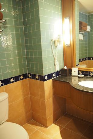 Imagen de la habitación del Hotel Woodlands and Resort. Foto 8