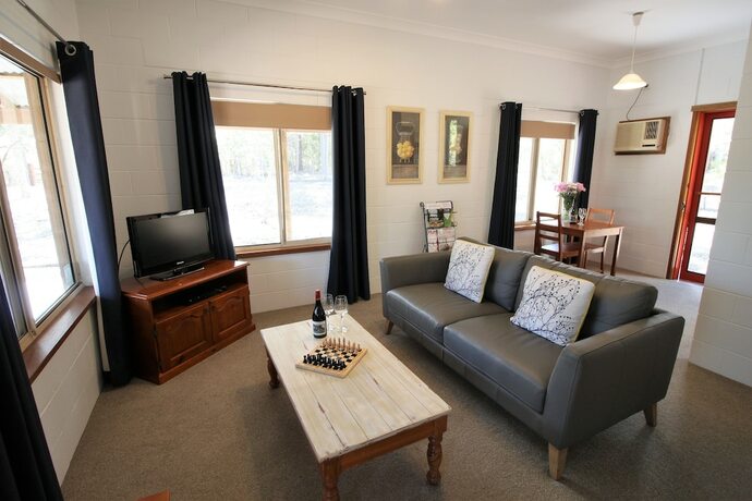 Imagen de la habitación del Hotel Woodlane Cottages. Foto 17