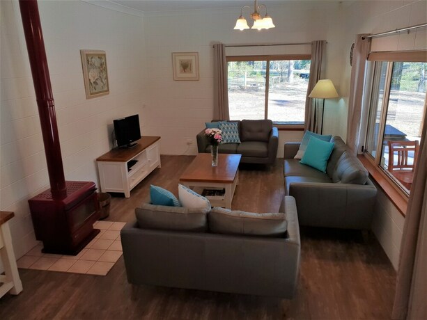 Imagen de la habitación del Hotel Woodlane Cottages. Foto 29