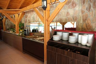 Imagen del bar/restaurante del Hotel Woodline. Foto 2