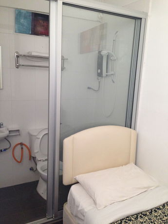 Imagen de la habitación del Hotel Woodpecker Lodge Kuching. Foto 13