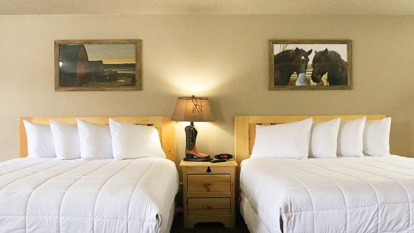 Imagen de la habitación del Hotel Woodside Dells And Suites. Foto 8