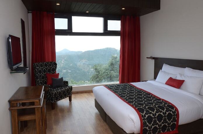 Imagen de la habitación del Hotel Woodsmoke Resort And Spa. Foto 12