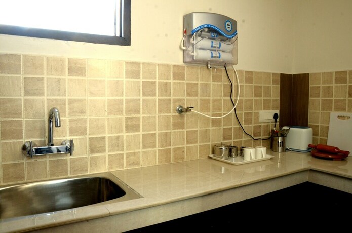 Imagen de la habitación del Hotel Woodsmoke Resort And Spa. Foto 13