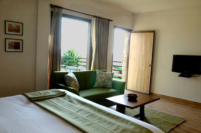 Imagen de la habitación del Hotel Woodsmoke Resort And Spa. Foto 14