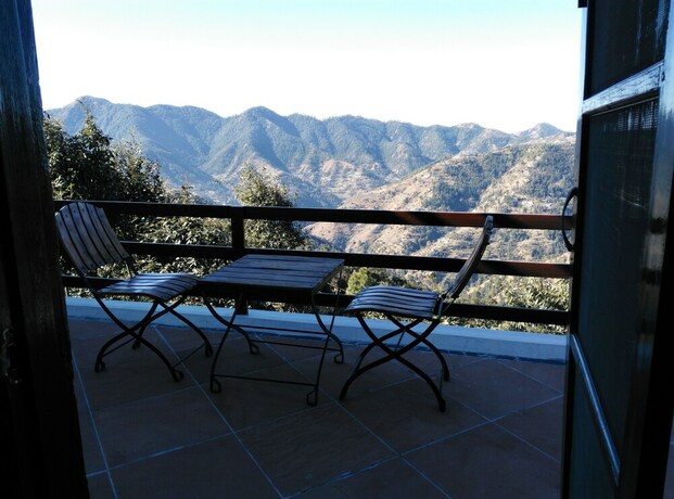 Imagen de la habitación del Hotel Woodsmoke Resort And Spa. Foto 16