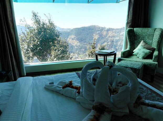 Imagen de la habitación del Hotel Woodsmoke Resort And Spa. Foto 17