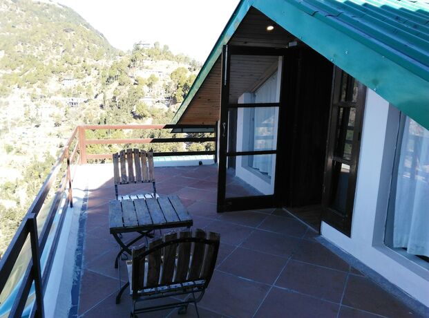Imagen de la habitación del Hotel Woodsmoke Resort And Spa. Foto 21