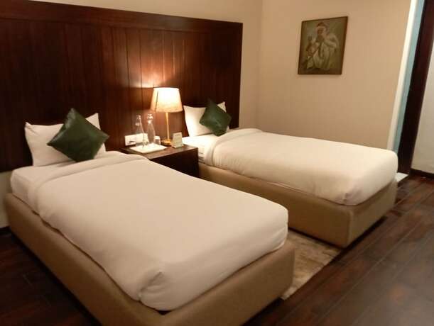 Imagen de la habitación del Hotel Woodsmoke Resort And Spa. Foto 22
