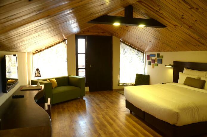 Imagen de la habitación del Hotel Woodsmoke Resort And Spa. Foto 23