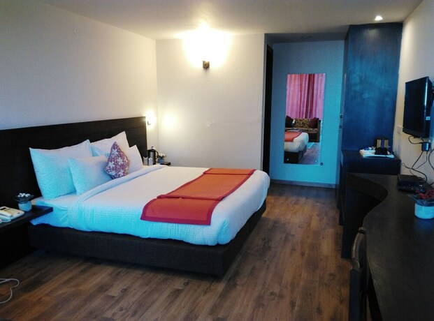 Imagen de la habitación del Hotel Woodsmoke Resort And Spa. Foto 26